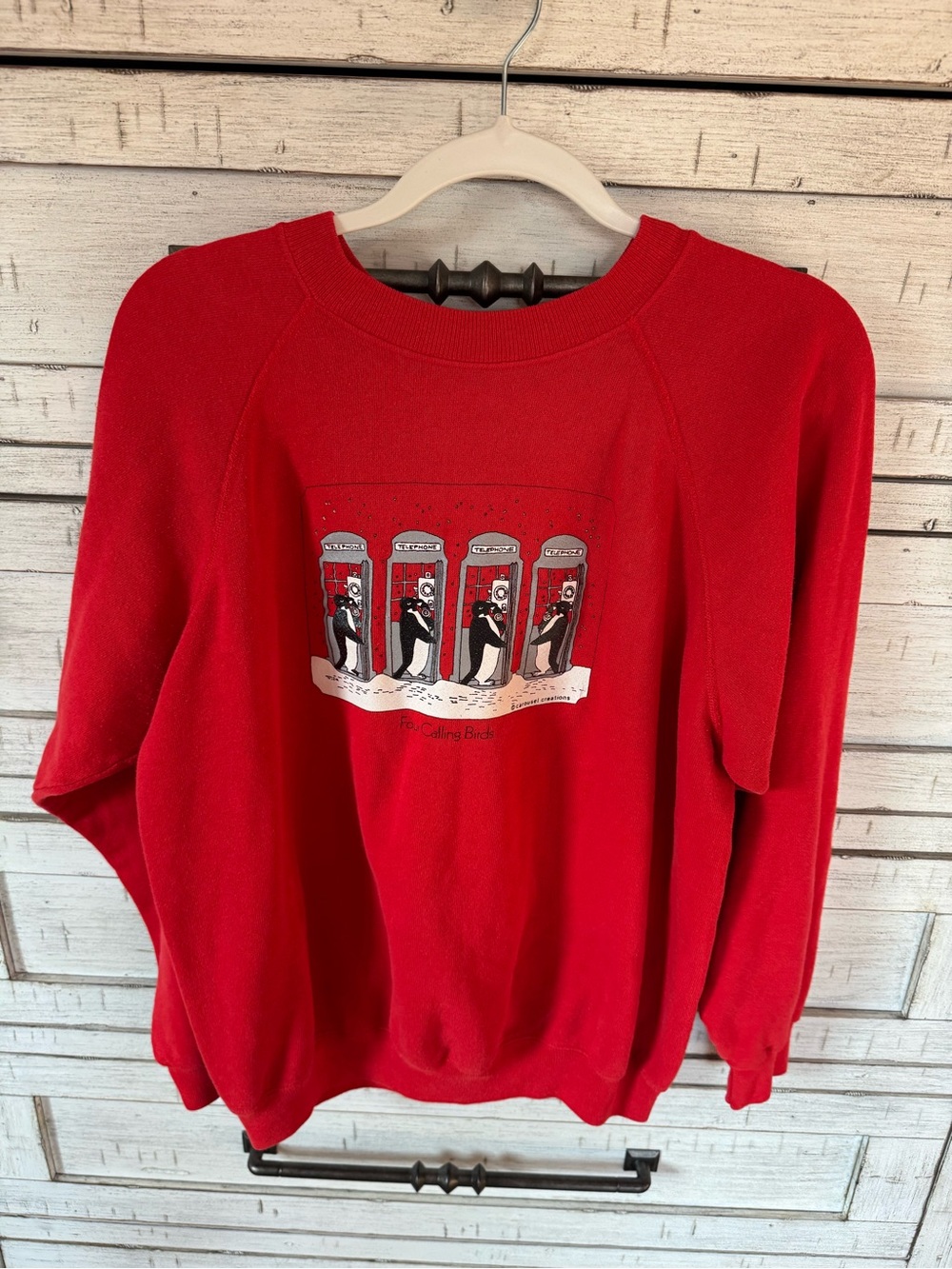 Red Graphic Crewneck Sweatshirt with Phone Booth Penguins